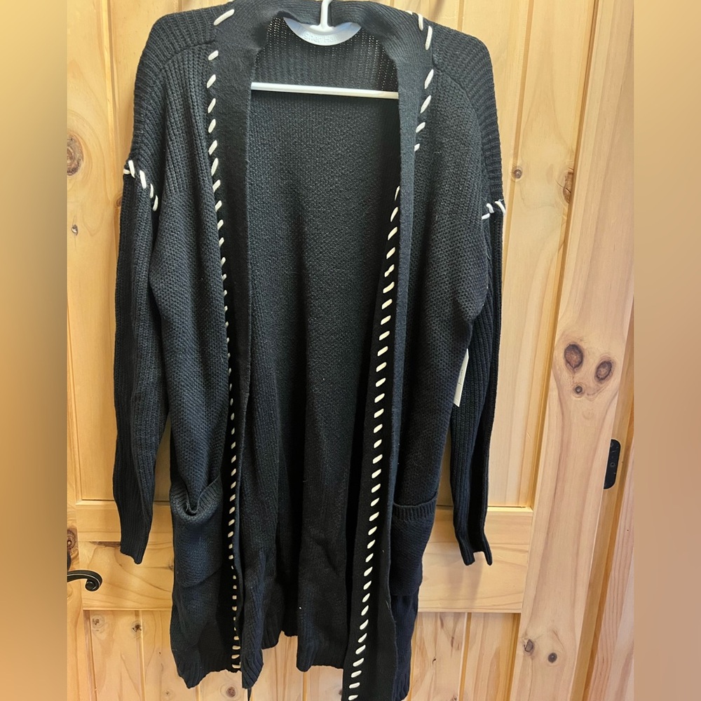 Elegant Black Cardigan with White Details